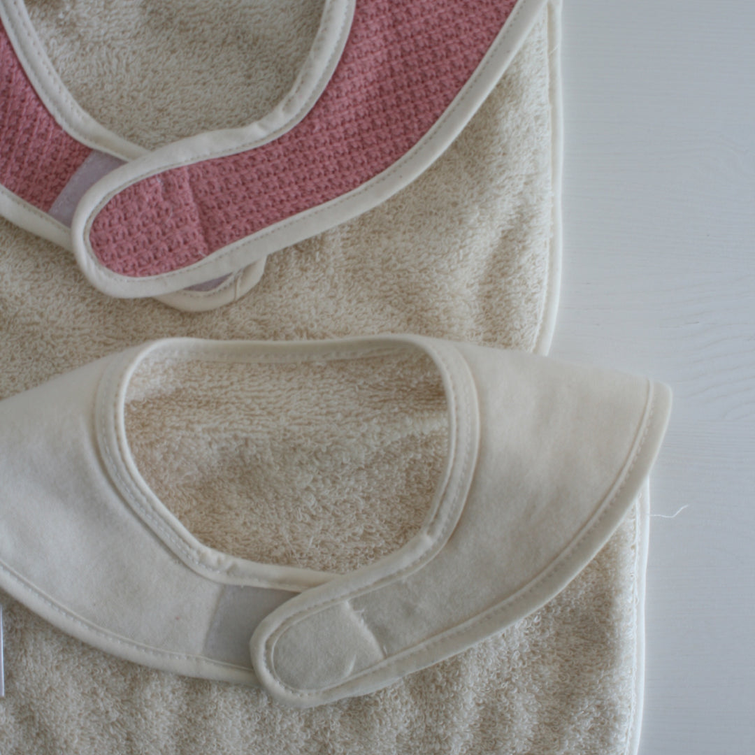 2 Bavoirs 1er Âge - Rose Et Crème